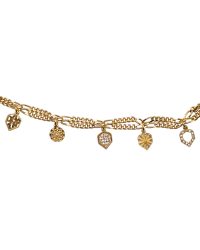 Pulsera  baño oro con 5 elementos oro.